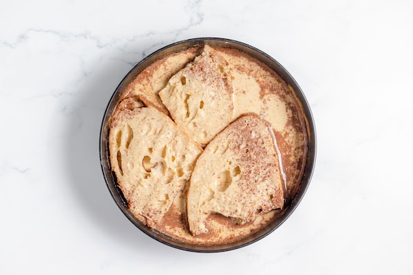 soaking sourdough bread in french toast mixture