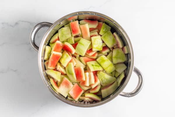 watermelon rind cooking in pan