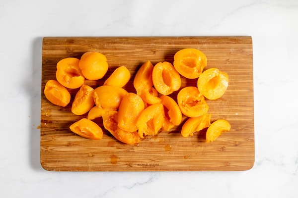 apricot halves on a cutting board