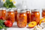 jars of home canned peach salsa