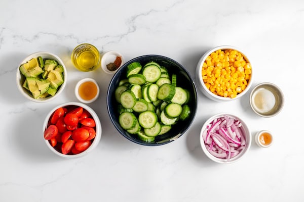 ingredients for avocado corn salad ready to mix