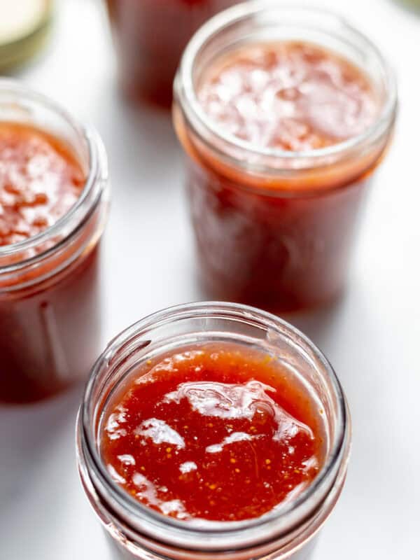 jars of fig jam on a table