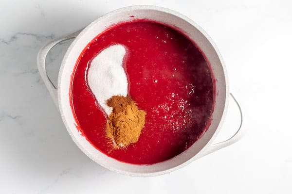 pureed plums with sugar and cinnamon