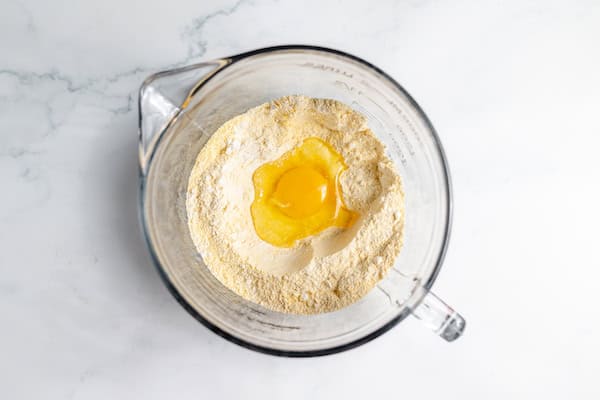 egg dropped in the center of dry ingredients