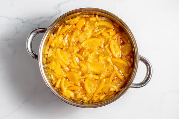 oranges and water in a pot