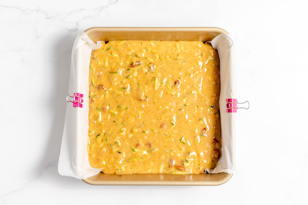 zucchini cake batter in pan