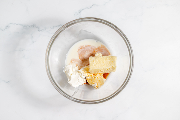 butter, sour cream, vanilla in a bowl