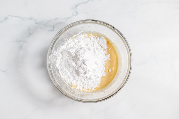 powdered sugar with butter, sour cream, and vanilla