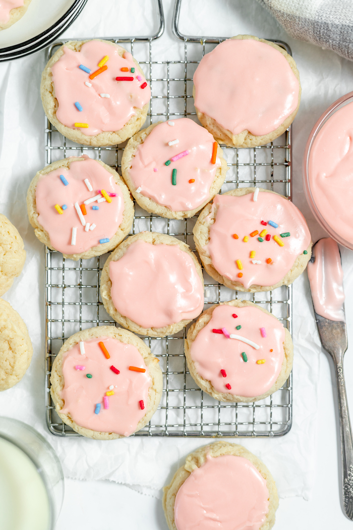 sour cream cookies with buttercream icing and sprinkles