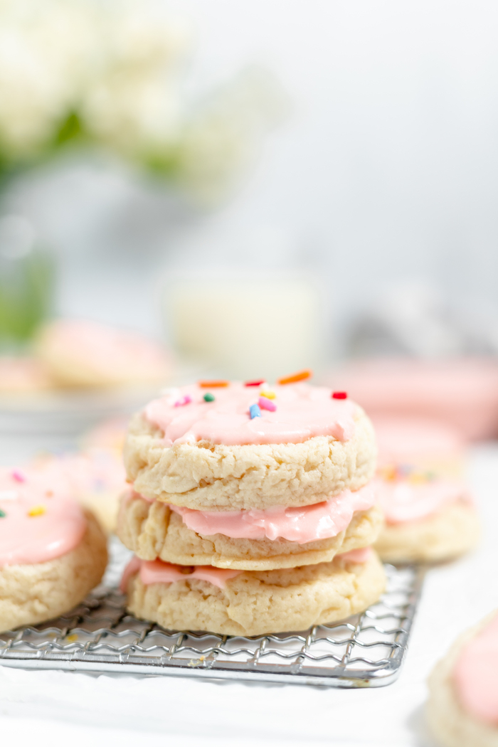 stack of frosted sour cream cookies
